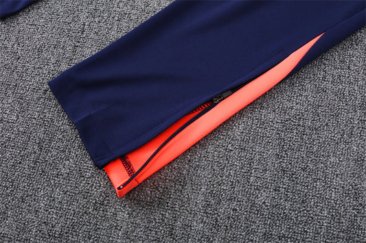 Chándal de entrenamiento FC Barcelona - Diseño moderno en coral y azul marino