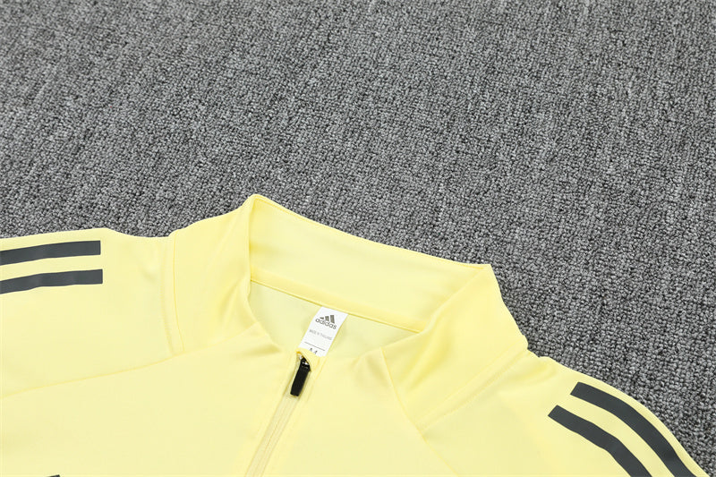 REAL MADRID – CONJUNTO DE ENTRENAMIENTO AMARILLO/GRIS 2025/26