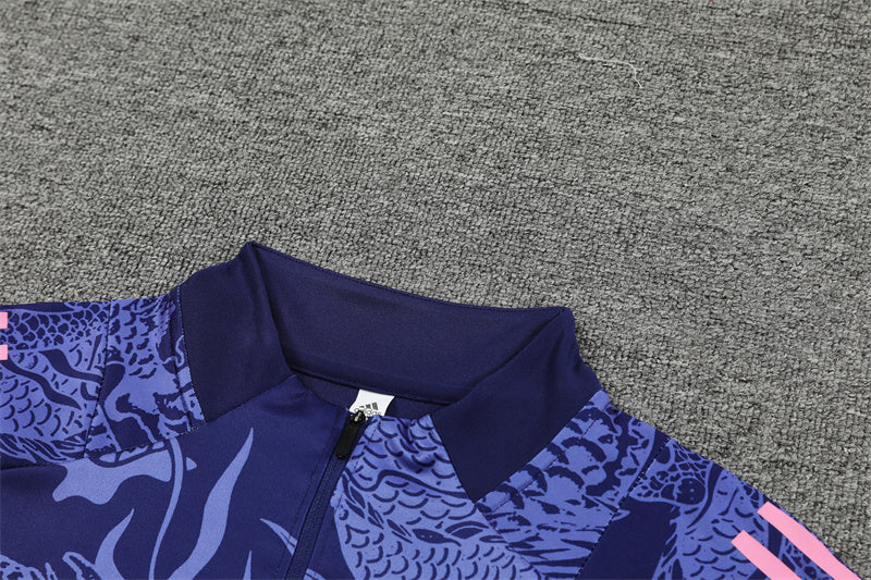 Chándal Oficial Real Madrid 24/25 - Edición Dragón Azul con Detalles en Rosa