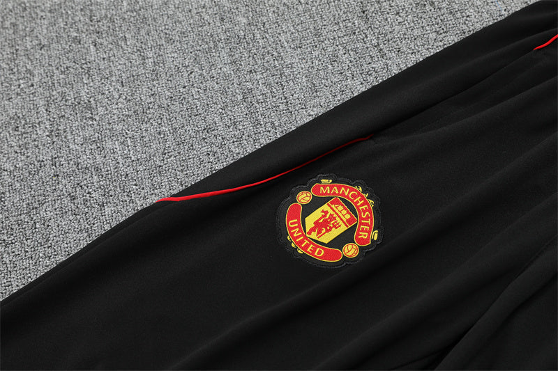MANCHESTER UNITED – KIT DE CALENTAMIENTO 2025/26