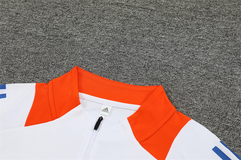 Chándal Oficial Japón 24/25 - Edición Blanca con Detalles en Azul y Naranja