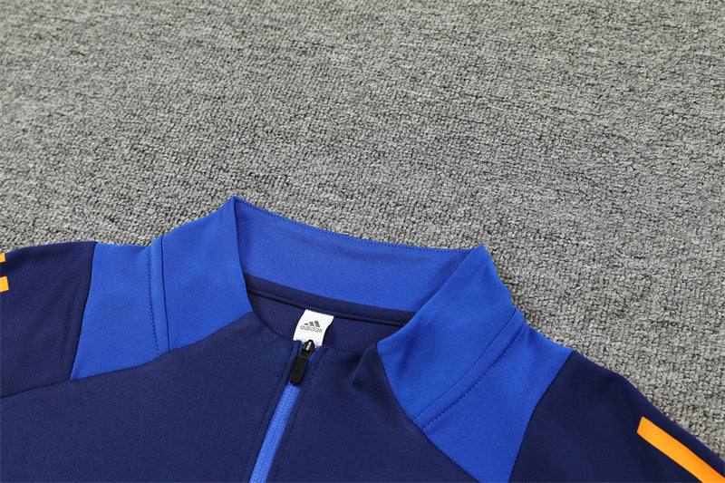 Chándal Oficial Juventus 24/25 - Edición Azul Oscuro con Detalles en Naranja y Azul Claro