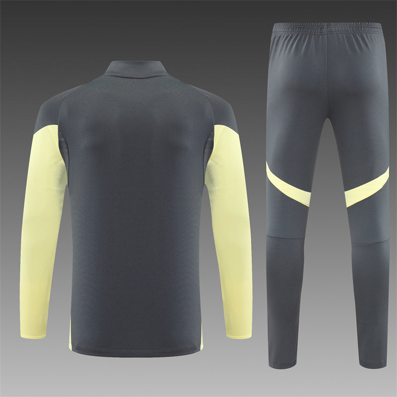 REAL MADRID – CONJUNTO DE ENTRENAMIENTO GRIS/AMARILLO 2025/26
