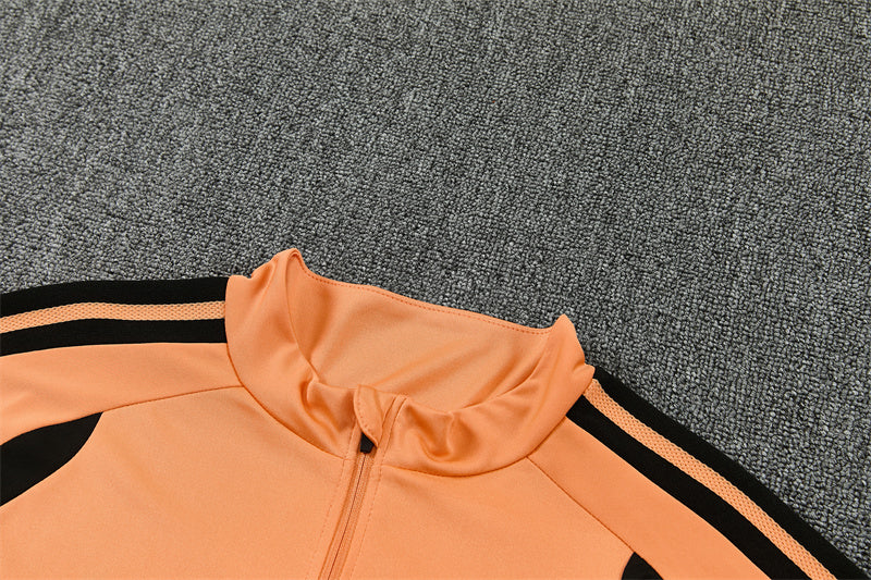 Chándal Arsenal Naranja y Negro 2026/27 – Adidas – Conjunto de Entrenamiento