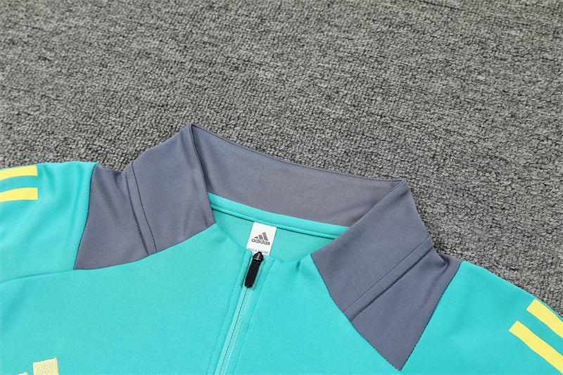 Chándal Oficial Ajax 24/25 - Edición Verde Aqua con Detalles en Gris y Amarillo