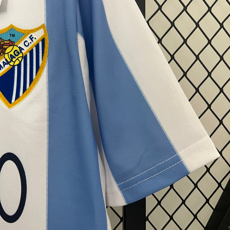 Camiseta Retro Málaga CF 2012/13 – Primera Equipación UEFA Champions League