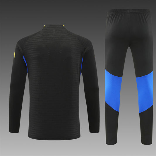 Chándal de Entrenamiento Manchester United 25/26 – Negro/Azul/Amarillo