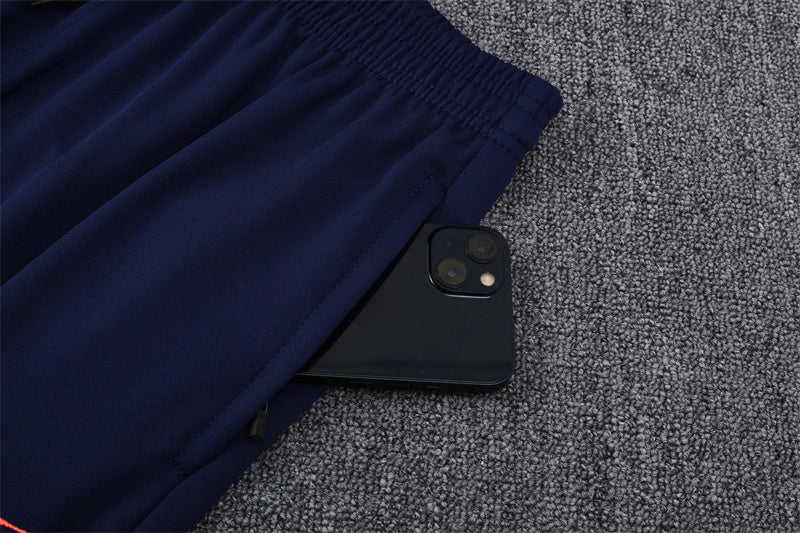 Chándal FC Barcelona - Elegancia Azul y Coral