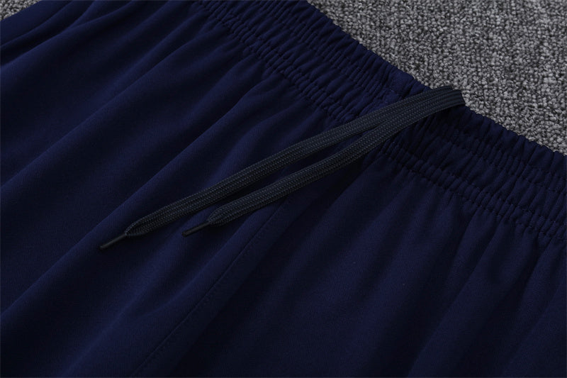 Chándal FC Barcelona - Elegancia Azul y Coral