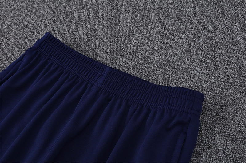 Chándal FC Barcelona - Elegancia Azul y Coral