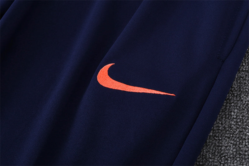 Chándal FC Barcelona - Elegancia Azul y Coral