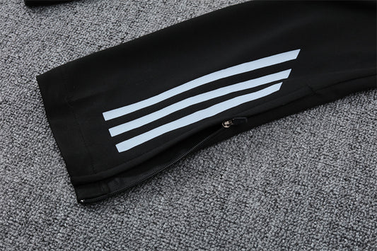 Chándal Real Madrid - Diseño Abstracto en Blanco, Naranja y Negro