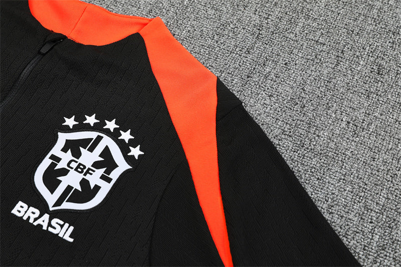 Chándal Brasil 2025/26 – Negro con detalles naranja