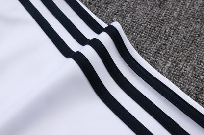 Chándal Real Madrid 2025/2026 – Blanco, Negro y Lima