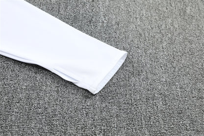 Chándal Real Madrid x Marvel Temporada 2025/2026 – Edición Especial Blanco y Negro