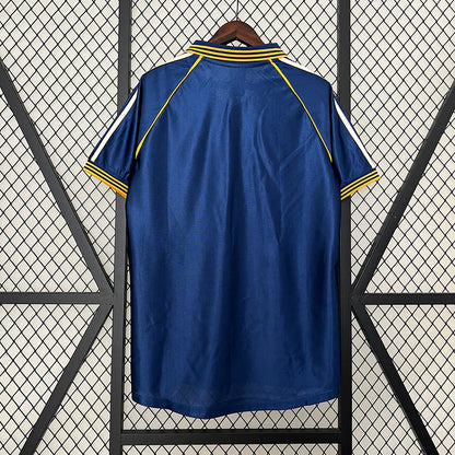 Camiseta Retro Real Madrid 1999/2000 – Segunda Equipación “Champions Glory”
