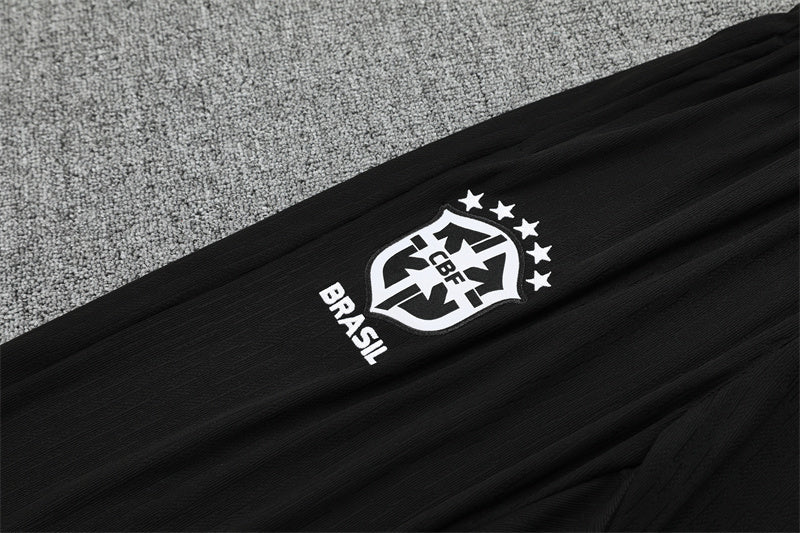 Chándal Brasil 2025/26 – Negro con detalles naranja