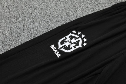 Chándal Brasil 2025/26 – Negro con detalles naranja