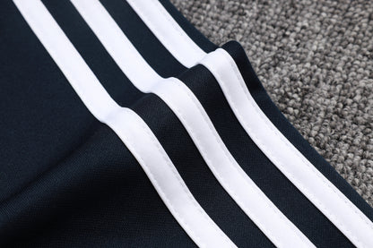 Chándal Real Madrid 2025/2026 – Azul Marino con Detalles Blancos y Amarillos