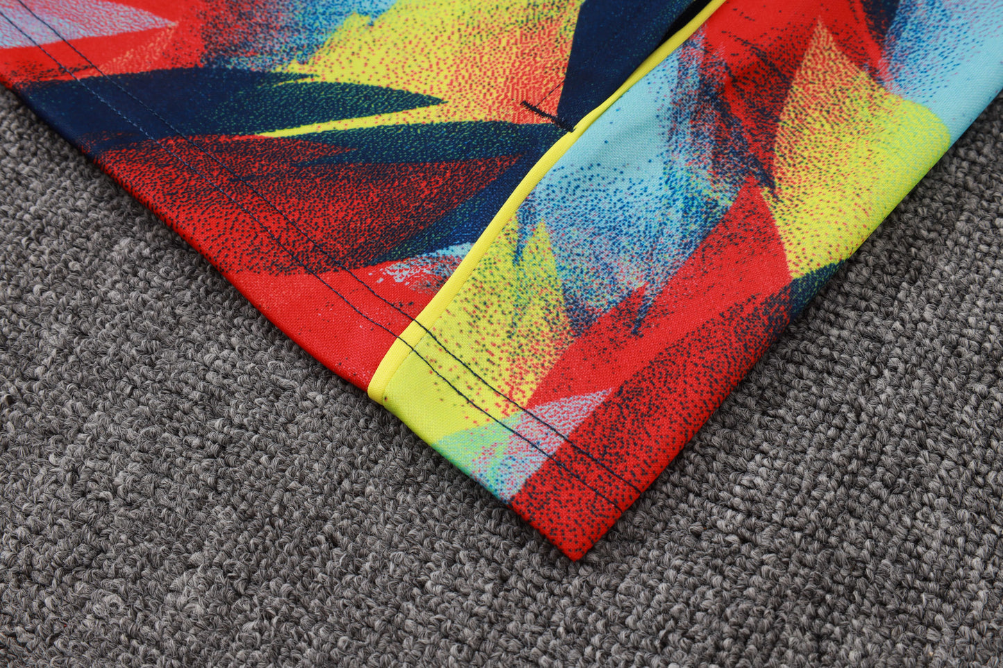Chándal Arsenal 2025/2026 – Edición Multicolor “Fire Motion”