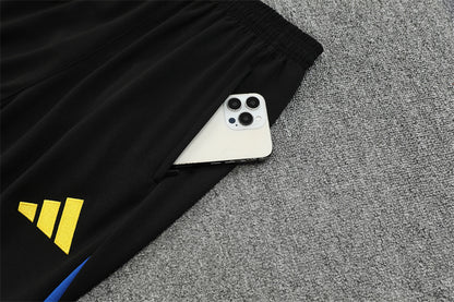 Chándal de Entrenamiento Manchester United 25/26 – Negro/Azul/Amarillo