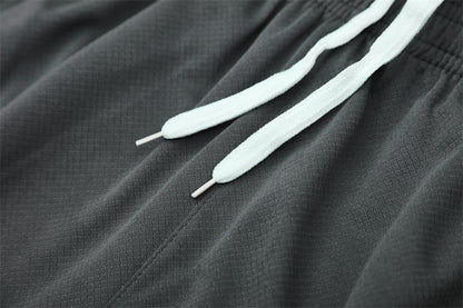 Set Oficial Bayern Múnich Tercera Equipación 25/26 – Intensidad Alemana en Naranja y Gris