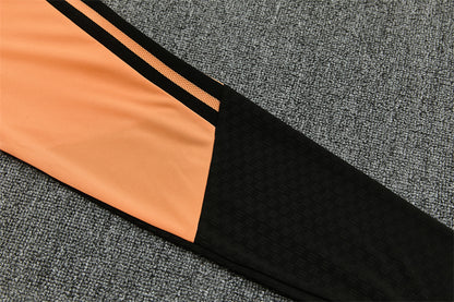 Chándal Arsenal Naranja y Negro 2026/27 – Adidas – Conjunto de Entrenamiento