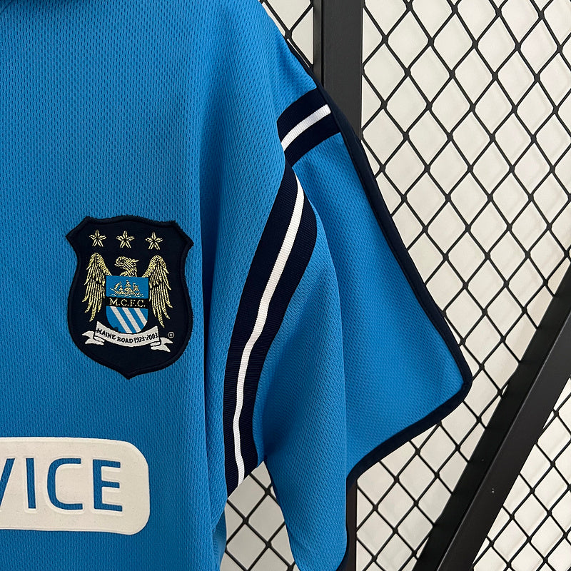 Camiseta Manchester City Home Le Coq Sportif – First Advice (2003-2004)