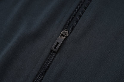 Chándal Real Madrid 2025/2026 – Negro con Detalles Amarillos