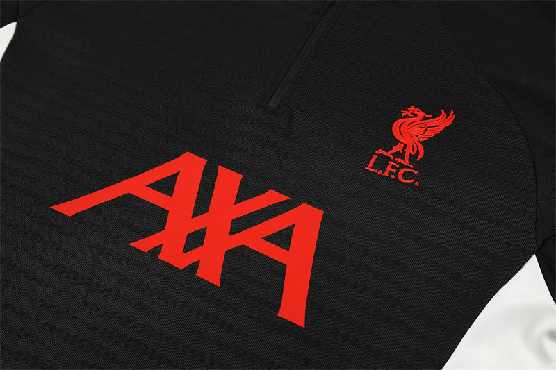 Liverpool 25/26 – chándal de entrenamiento negro con detalles en rojo y blanco
