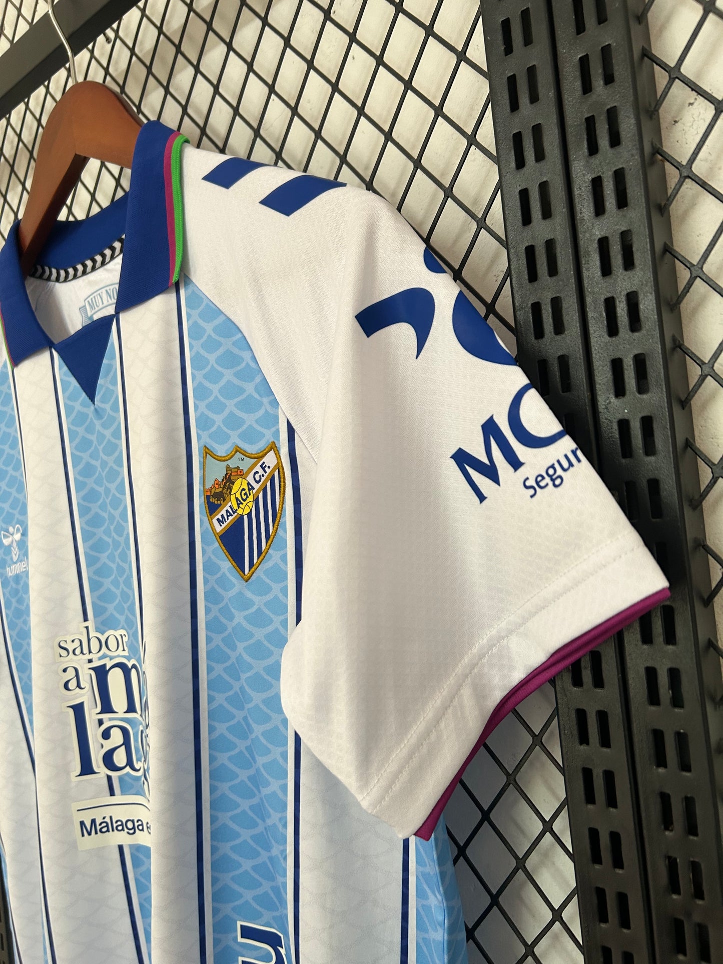 Camiseta Málaga CF Local 26/27 – Blanca y Celeste