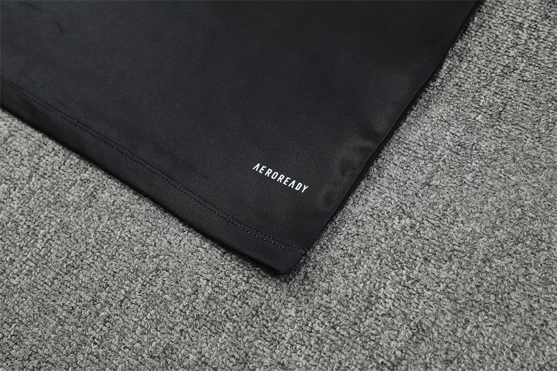 Real Madrid – Conjunto de Entrenamiento Negro/Naranja (Edición Impacto)