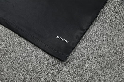 Real Madrid – Conjunto de Entrenamiento Negro/Naranja (Edición Impacto)