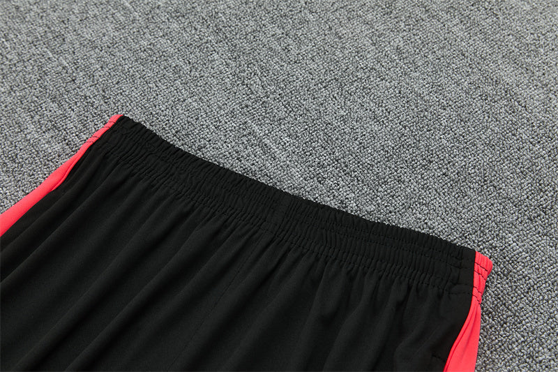 Conjunto Brasil 2026/2027 – Negro/Rojo Entrenamiento