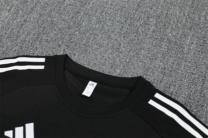 Real Madrid 25/26 Visitante – Elegancia Negra con Energía Moderna