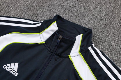 Chándal Real Madrid 2025/2026 – Azul Marino con Detalles Blancos y Amarillos