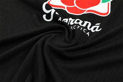 Chándal Brasil 2025/26 – Negro con detalles naranja