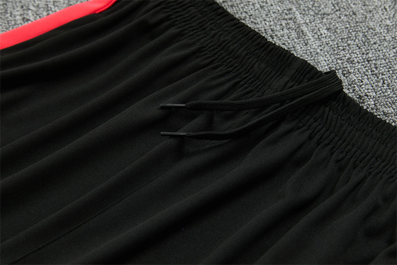 Conjunto Brasil 2026/2027 – Negro/Rojo Entrenamiento