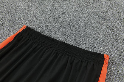 Conjunto Países Bajos 2026/2027 – Negro/Naranja Entrenamiento
