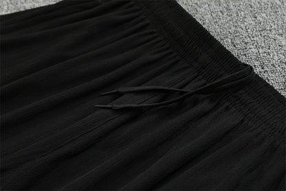 Chándal Brasil 2025/26 – Negro con detalles naranja