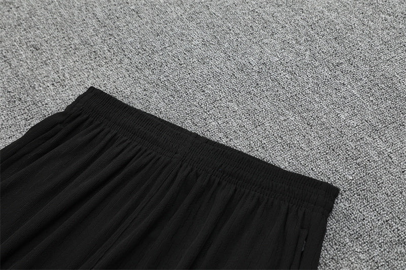 Chándal Brasil 2025/26 – Negro con detalles naranja