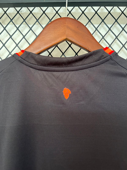 Camiseta AC Milan 2026/2027 Alternativa – Negra con Detalles Naranja Oficial Puma