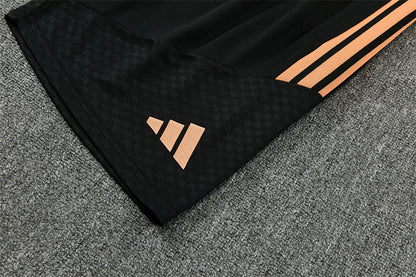 Conjunto Arsenal Entrenamiento Negro y Naranja 26/27
