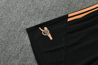 Conjunto Arsenal Entrenamiento Negro y Naranja 26/27
