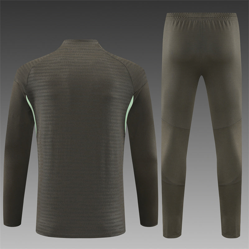 Real Madrid 25/26 – Chándal de entrenamiento tono carbón con detalles verde menta