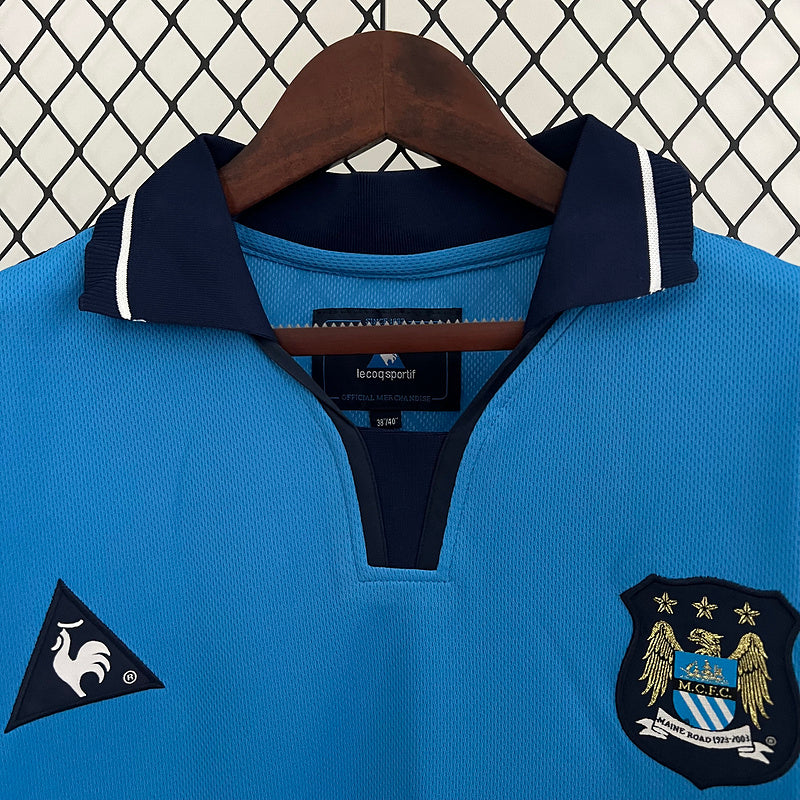 Camiseta Manchester City Home Le Coq Sportif – First Advice (2003-2004)