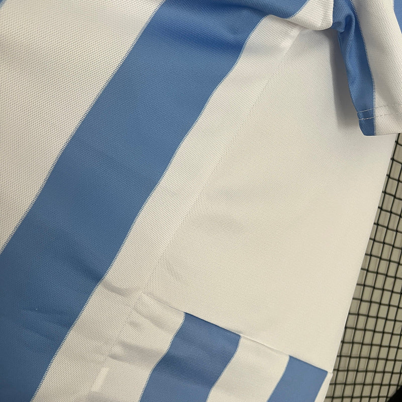 Camiseta Retro Málaga CF 2012/13 – Primera Equipación UEFA Champions League