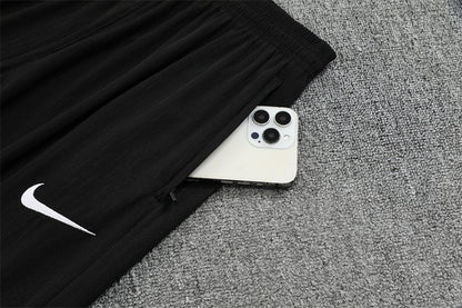 Chándal Brasil 2025/26 – Negro con detalles naranja