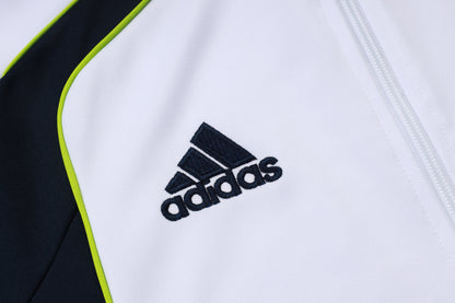 Chándal Real Madrid 2025/2026 – Blanco, Negro y Lima