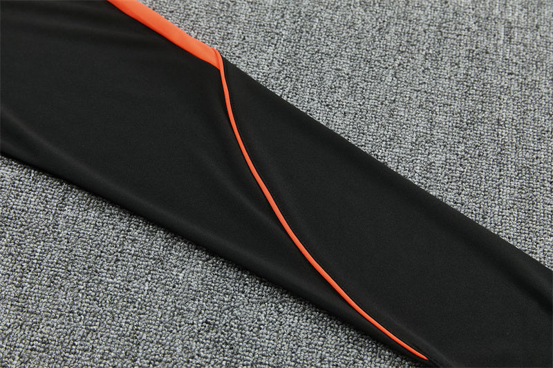 Conjunto Países Bajos 2026/2027 – Negro/Naranja Entrenamiento